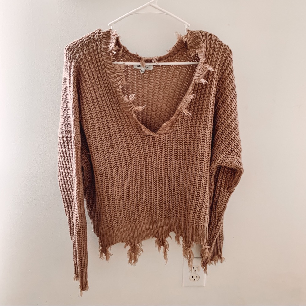 Frayed sweater